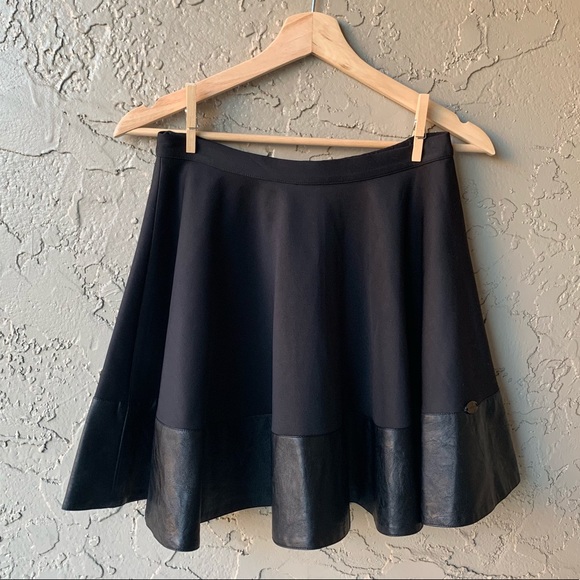 Dresses & Skirts - Black Leather trim mini skirt